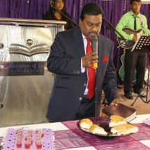 Communion-3-As-Pastor-prepares-the-Holy-Meal-Musicians-Support-our-Reminder-of-the-Meaning-of-these-Actions